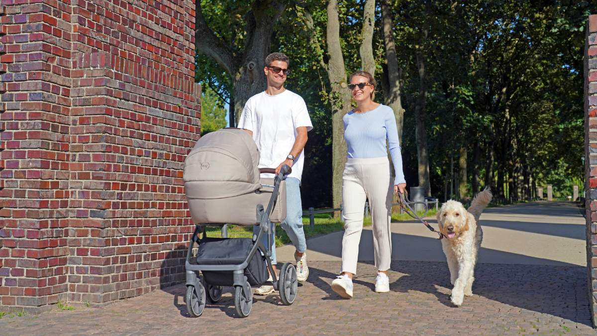 young-family-with-dog-walking.jpg
